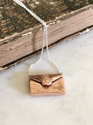 Envelope love letter locket in rose gold when opened reveals a secret letter