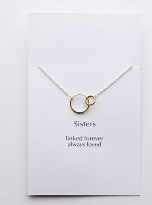 yellow gold linked circles on a sterling silver chain