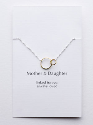 yellow gold linked circles on a sterling silver chain
